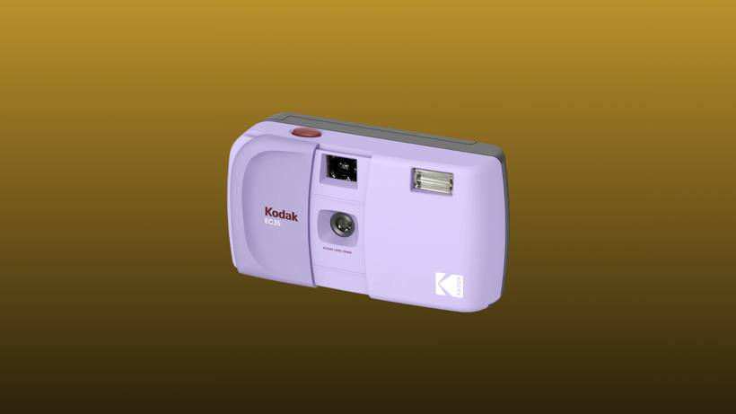 Purple KODAK EC35 35mm Film Camera on a mustard to black gradient background