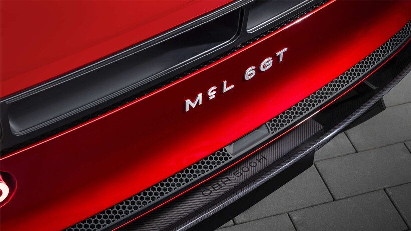 Red McLaren McL 6GT concept with low-slung bodywork and carbon-fibre construction