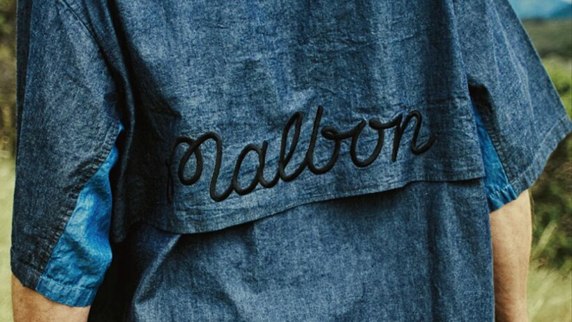 GDC x Malbon Golf denim chambray collection featuring lightweight golf tops and trousers in blue tones