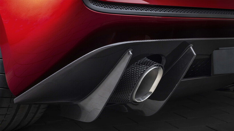 Red McLaren McL 6GT concept with low-slung bodywork and carbon-fibre construction
