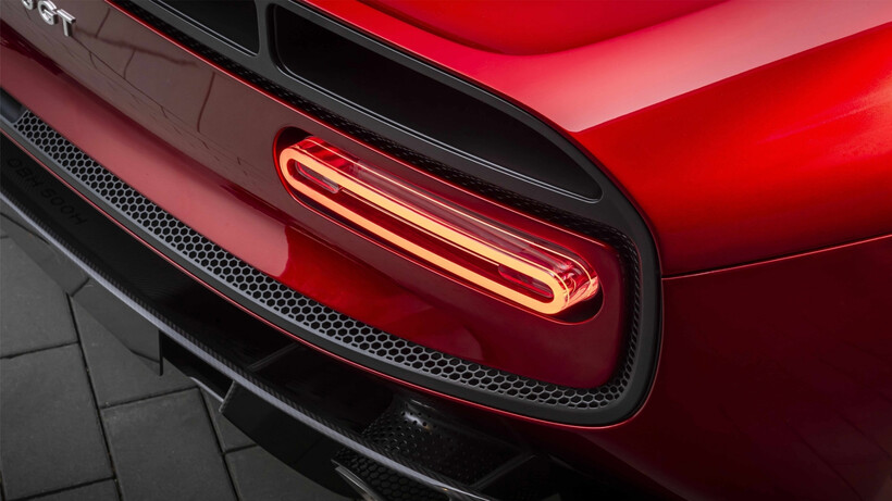 Red McLaren McL 6GT concept with low-slung bodywork and carbon-fibre construction
