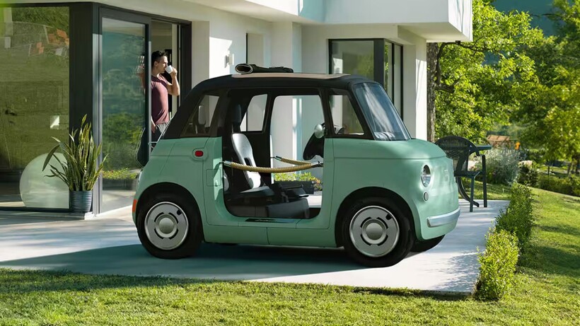 Mint green Fiat Topolino electric microcar designed for resorts, gated communities and short local trips