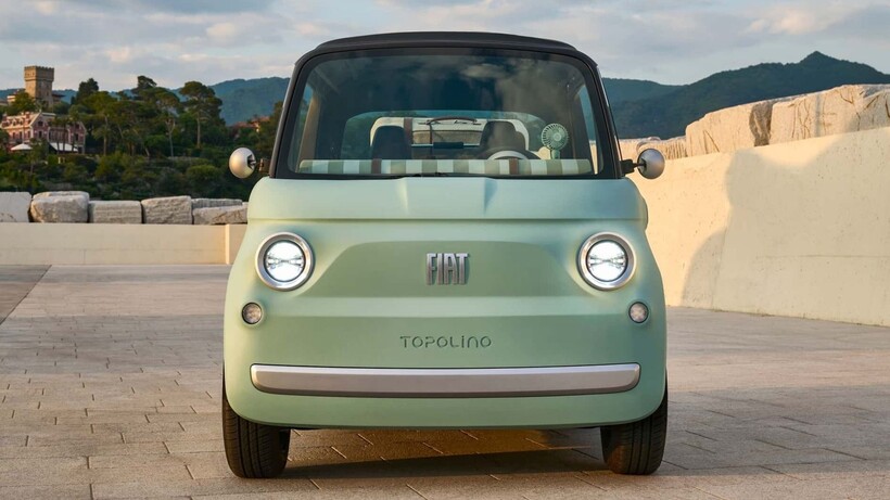 Mint green Fiat Topolino electric microcar designed for resorts, gated communities and short local trips