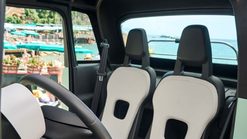 Mint green Fiat Topolino electric microcar designed for resorts, gated communities and short local trips